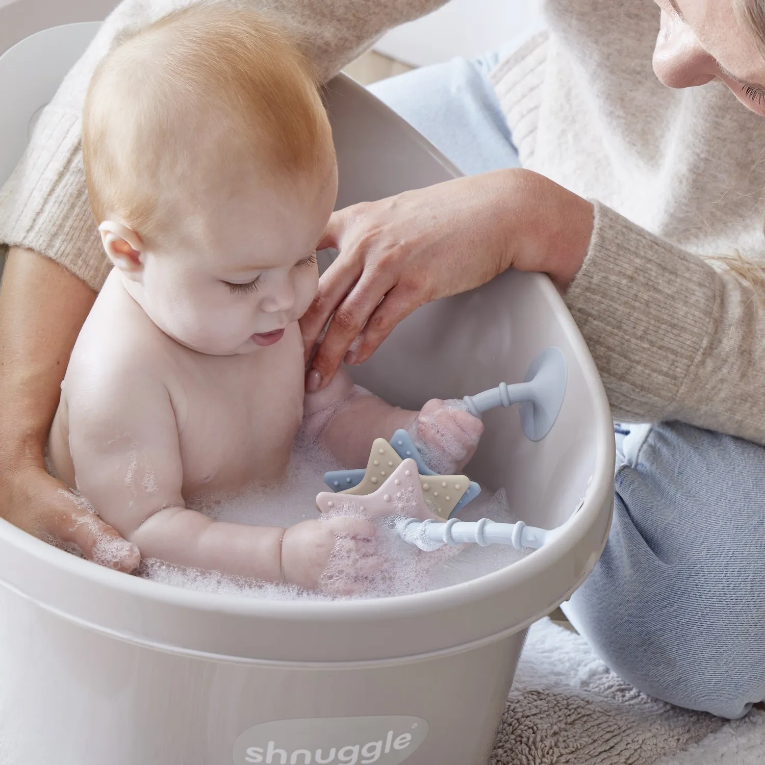 Shnuggle Stick n Play sanselegetøj stjerne silikone