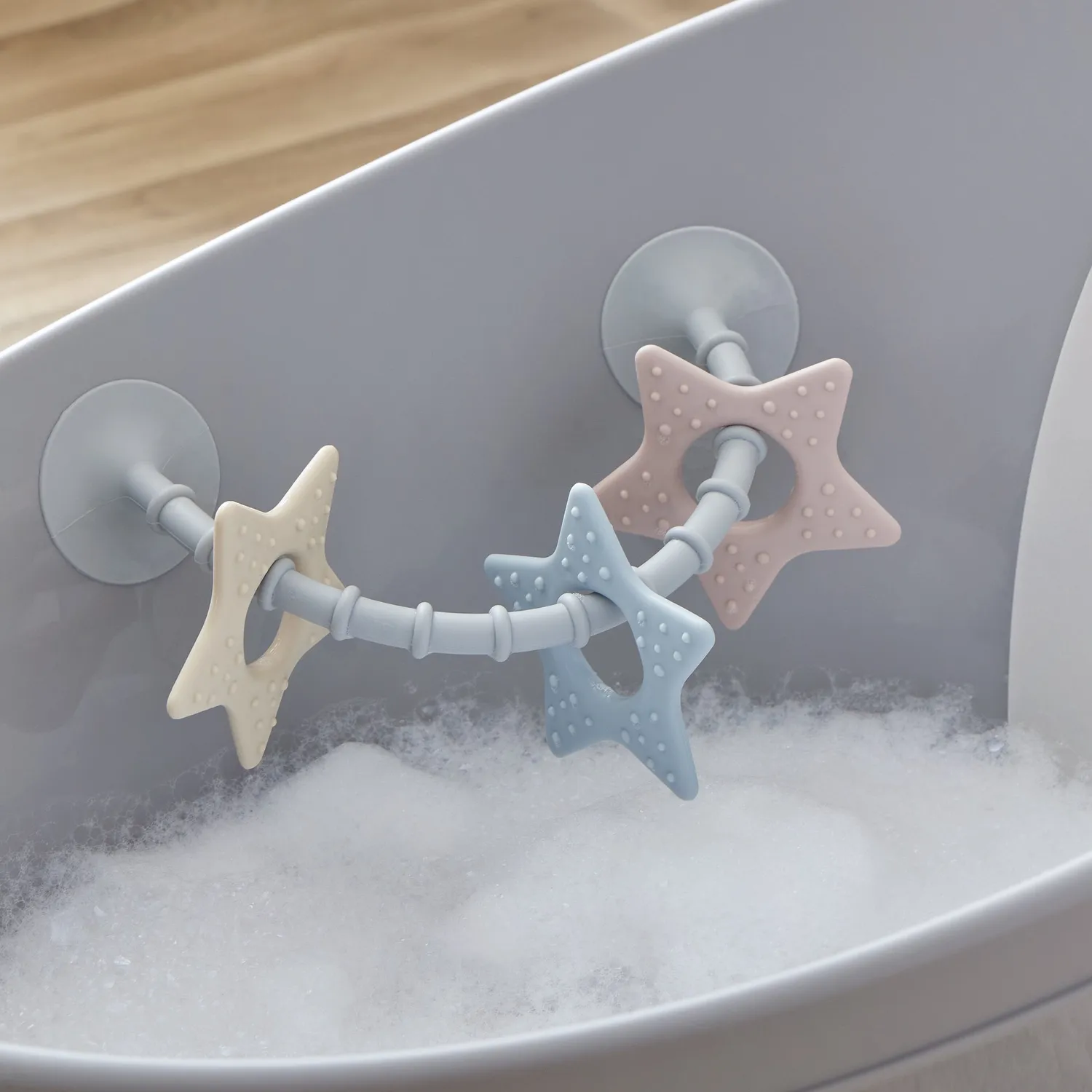 Shnuggle Stick n Play sanselegetøj stjerne silikone